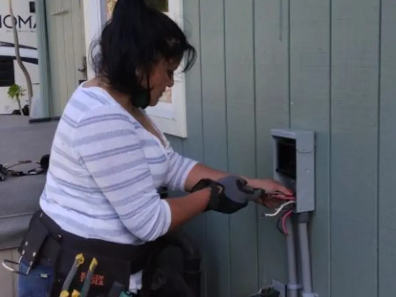 Licensed electrician wiring an exterior subpanel in Moses Lake North