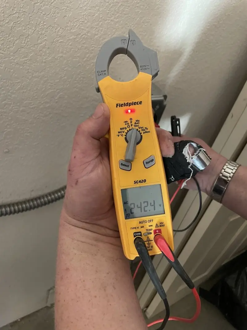 Voltage testing with clamp meter during Electrical Installation Services in Moses Lake North
